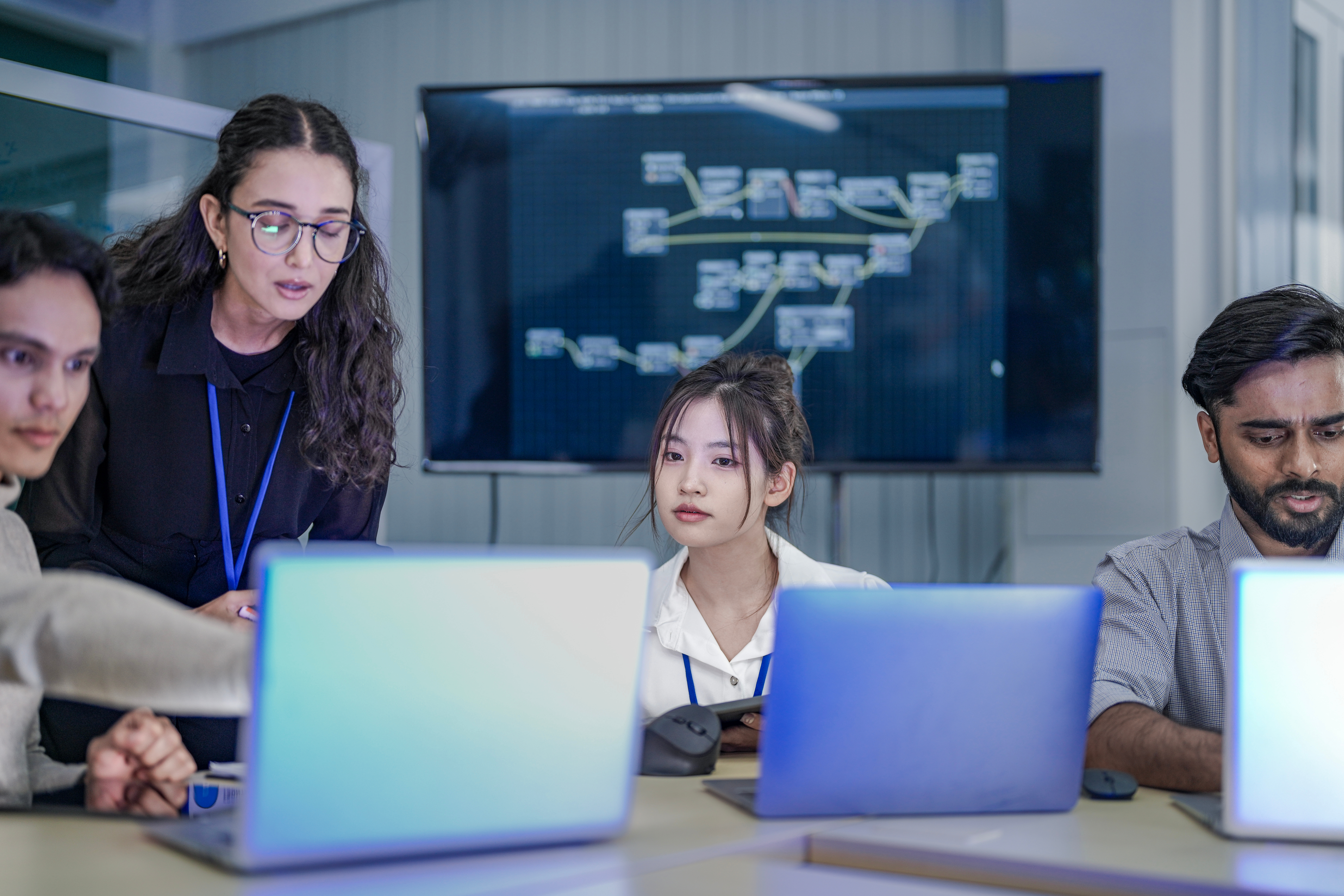 Instructor guiding cybersecurity students